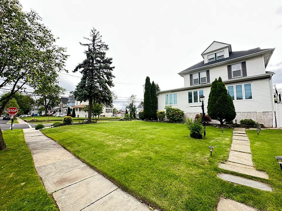 Walnut St side view of the house - main entrance for the 2nd flr unit.