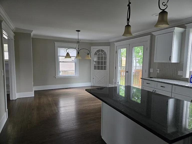 Kitchen and Dining Area with Granite Island