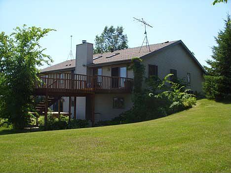 Side view of home in Summer