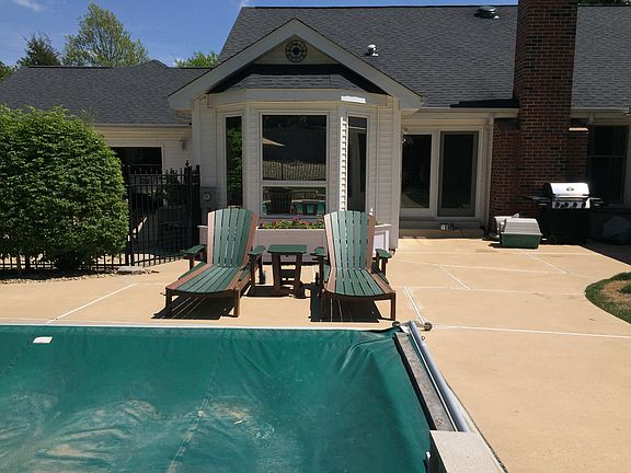Bay window overlooking pool