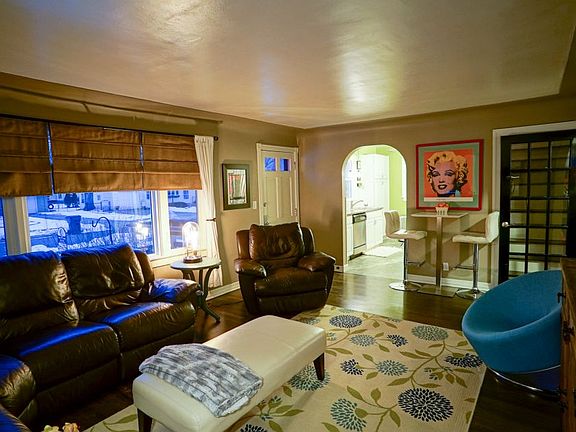 From the living room you will notice the charming arched doorways leading to kitchen and bedrooms as