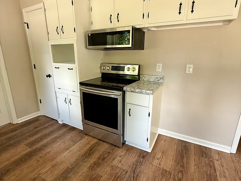 9116 Woodhaven Dr NW — Photo 8
