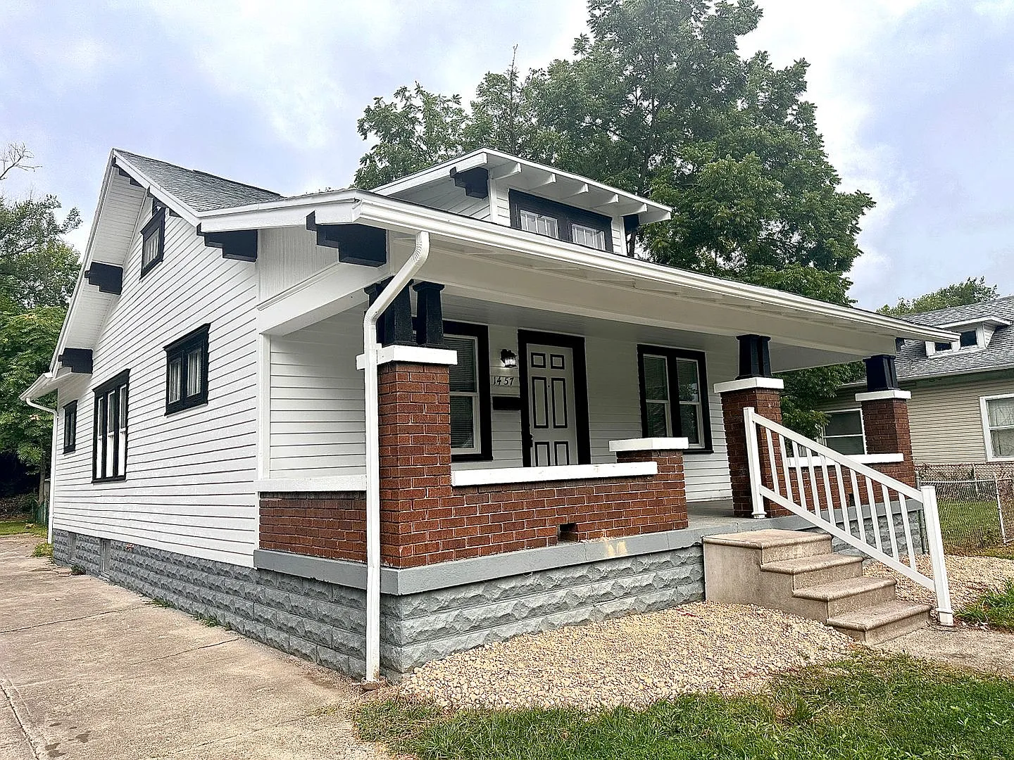 Historic Charm Meets Modern Living in this 2 bedroom Bungalow — Photo 2