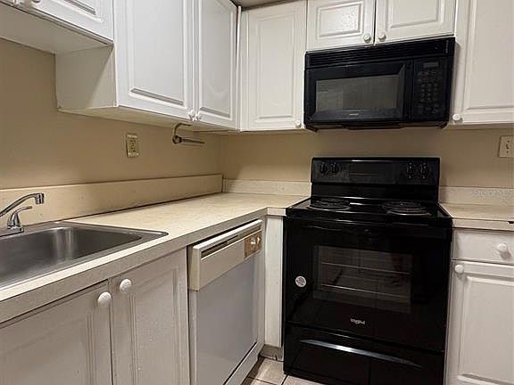 5th image of 203 POINSETTIA PINE COURT #102