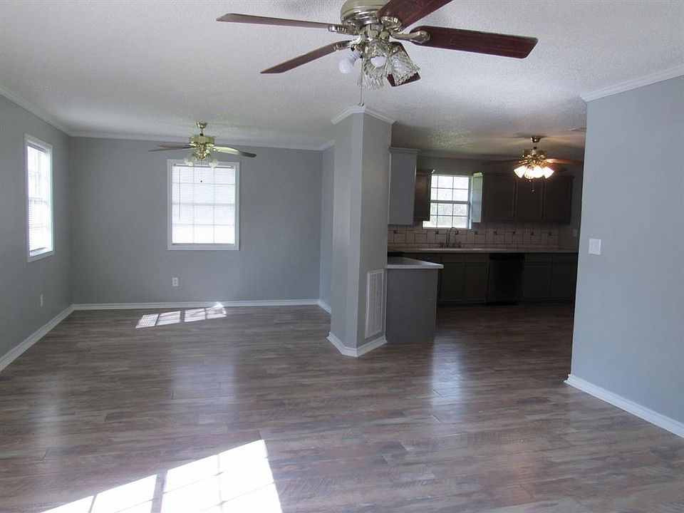 open living, dining and kitchen