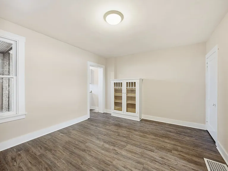 Charming Updated 2BR Home with New Flooring & Rear Porch — Photo 12