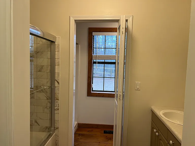 Separate door to toilet and shower stall.