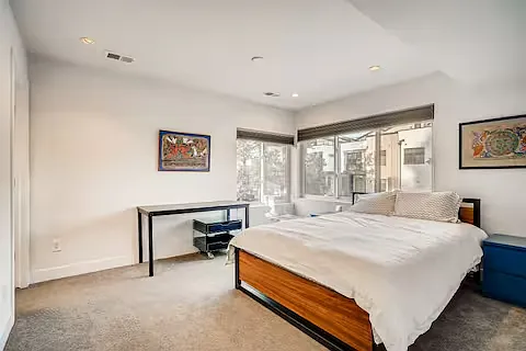 Bathroom and closet are on the left of this bright and sunny 2nd floor bedroom