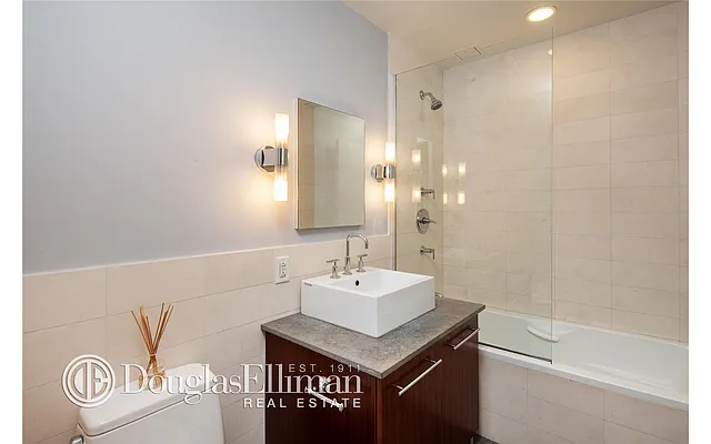 Sold by Douglas Elliman | media 11