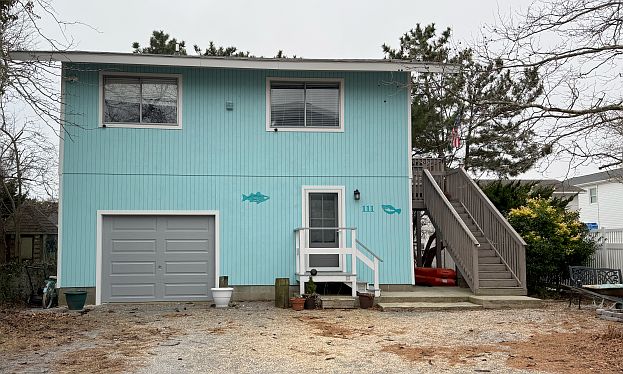 Front of House- Small Porch to Owner's Apartment is White w/Gray Railings, Stairs and Upper Deck will be painted in the same scheme