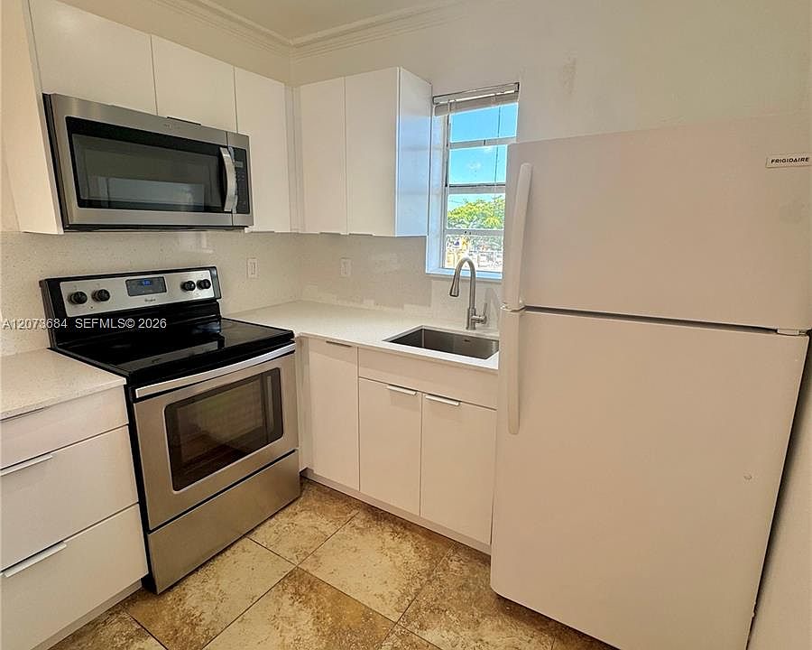 1st image of 1020 SW 7th St #Townhouse 9