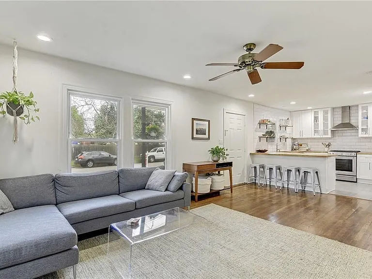 Bright and Spacious Open Concept Living Room to Kitchen - hardwood floors throughout! Updated Kitchen with New Appliances!