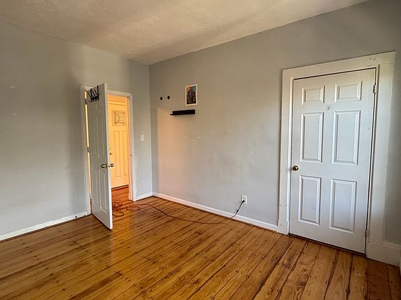 second bedroom looking towards closet and out to hallway