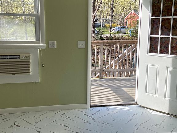 Kitchen leads outside to deck