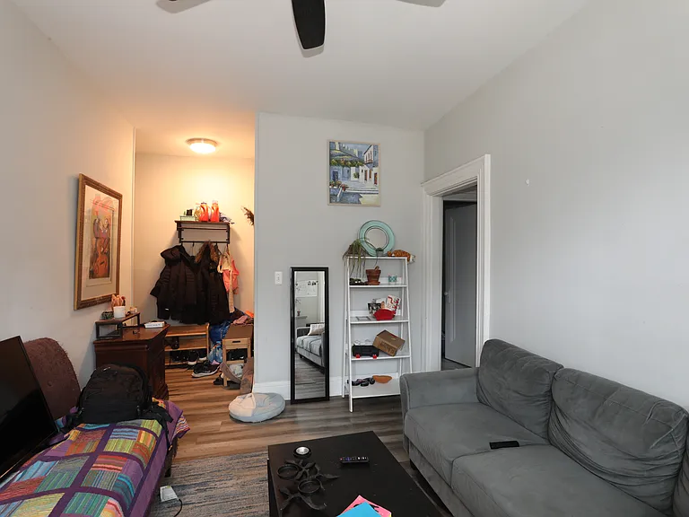 Living area with ample natural light and comfortable layout