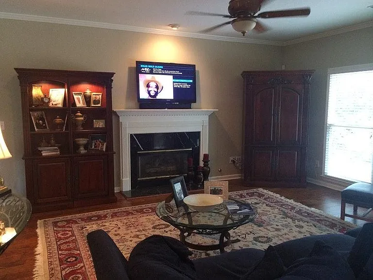SAMPLE FURNISHINGS: Family Room with gas fireplace