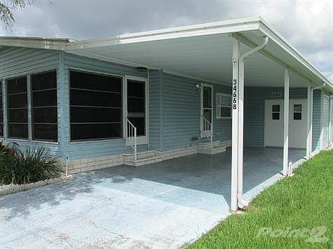 CARPORT AND SCREEN ROOM