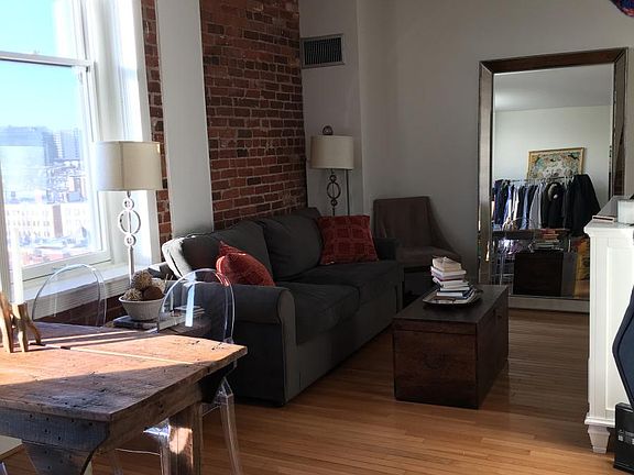 Main living space - large windows, custom Smith and Noble blinds