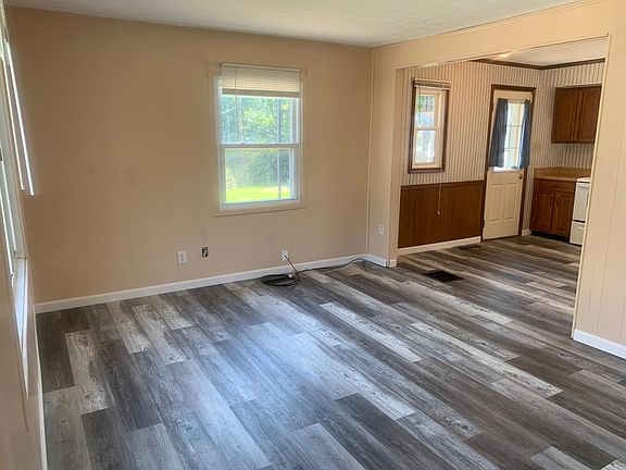 Living room Open to Kitchen with Brand New Vinyl Floor