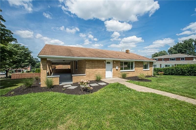 Completely updated 3bd, 2ba ranch on a perfectly landscaped, corner lot in Carnegie Park! Level front entry, spacious side porch