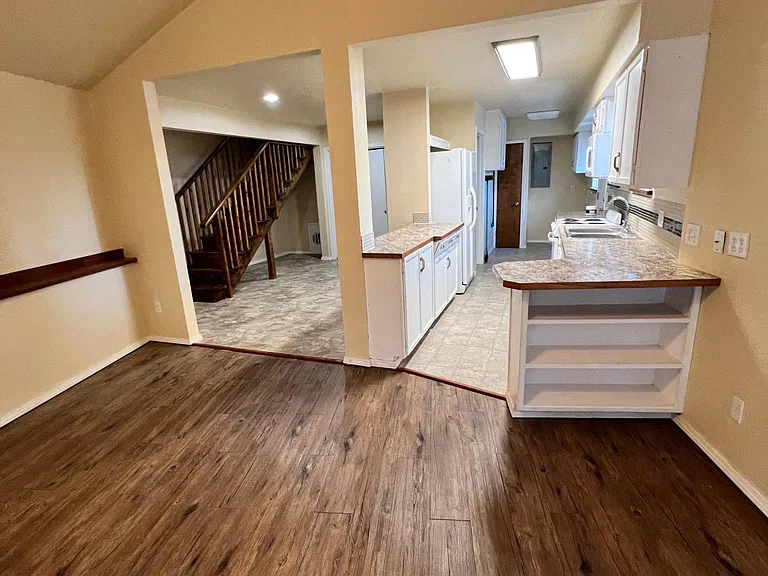 view from great room to dining and kitchen