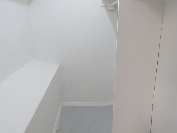 Walk-in closet in living r.