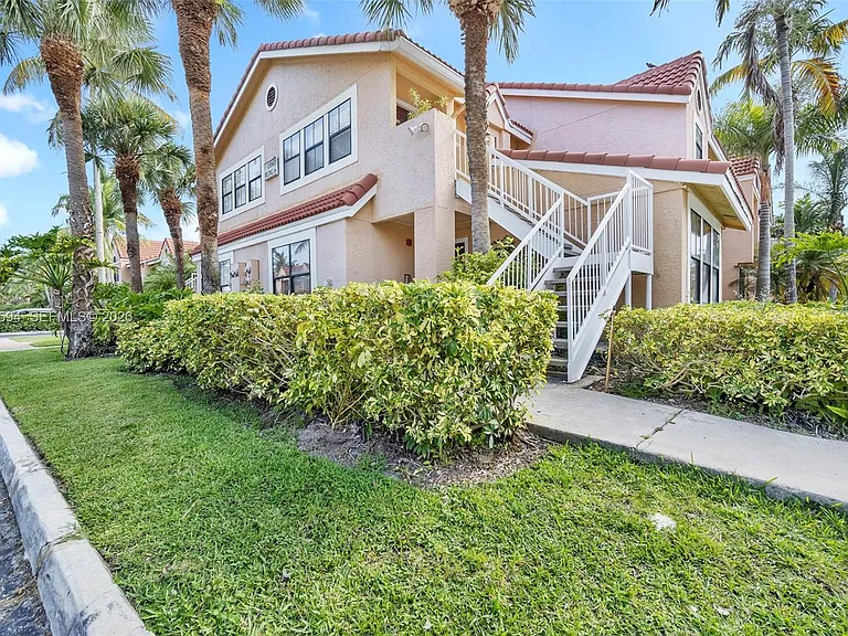 15560 SW 104th Ter #611 — Photo 1
