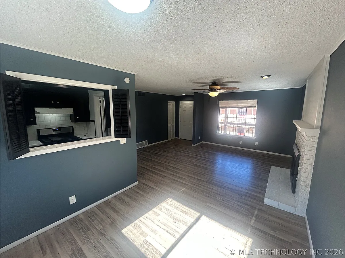 Building Photo - 4909 S Utica Ave #D