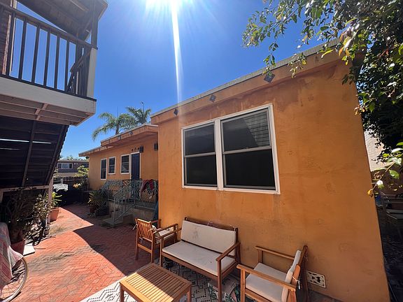 Charming Courtyard Retreat: Enjoy your morning coffee or evening relaxation in this private, sunlit courtyard. Perfect for unwinding after exploring the nearby Kensington and Adams Avenue hotspots.