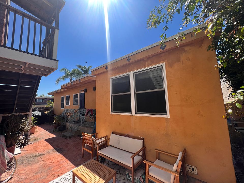 Charming Courtyard Retreat: Enjoy your morning coffee or evening relaxation in this private, sunlit courtyard. Perfect for unwinding after exploring the nearby Kensington and Adams Avenue hotspots.