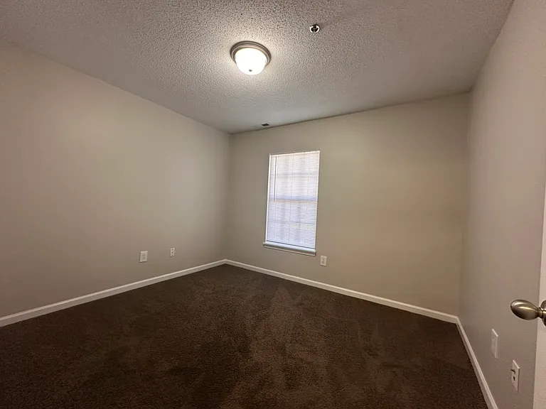 Downstairs 3 Bedroom Unit - Front Bedroom