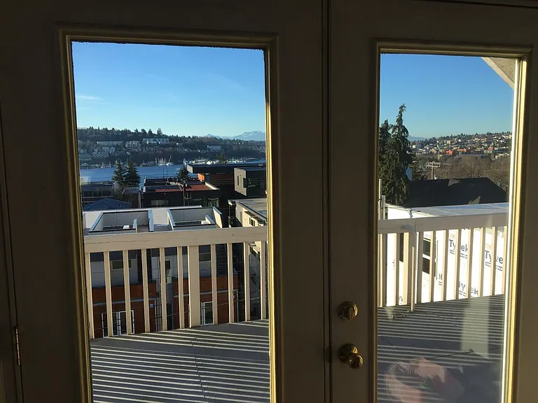 Deck view out french doors to Olympics