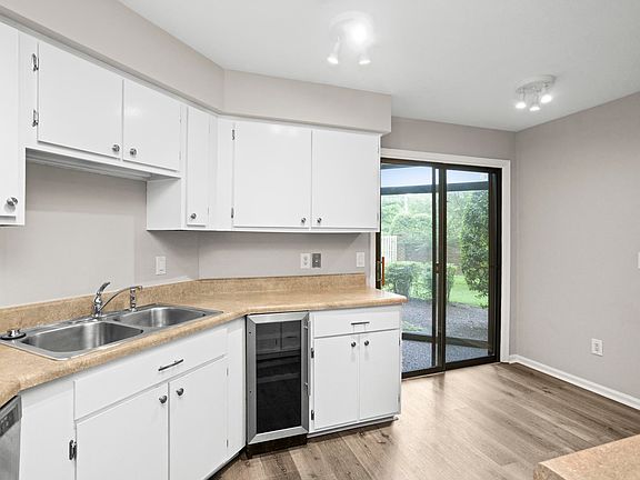 Eat in kitchen with enclosed porch attached.