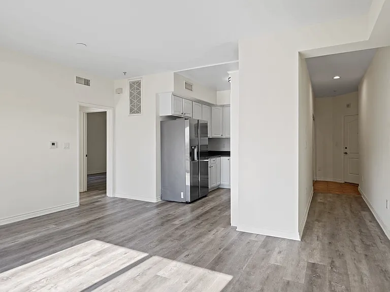 Dining and Living Room Space with New Vinyl Flooring