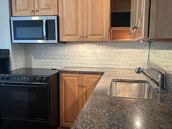 Kitchen Fully equipped 
New Fridge New Microwave 
Smooth top Range, Dishwasher, & Garbage Disposal