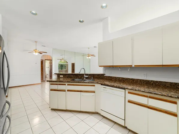 102 Oxford Court, Royal Palm Beach, FL 33411