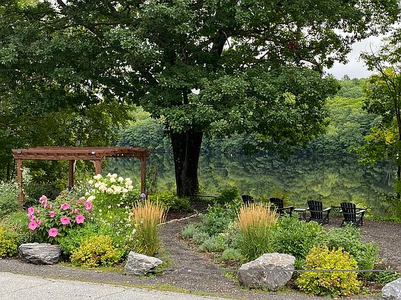 Garden view of reflections on the Kennebec