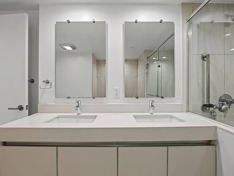 Bathroom with Double-Sink Vanity and Cabinet Storage