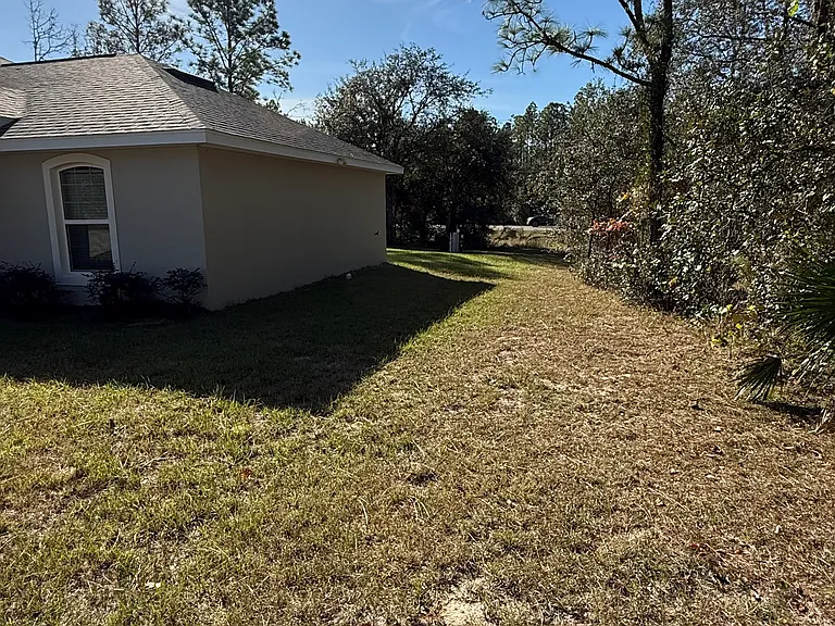 Front right side of house.