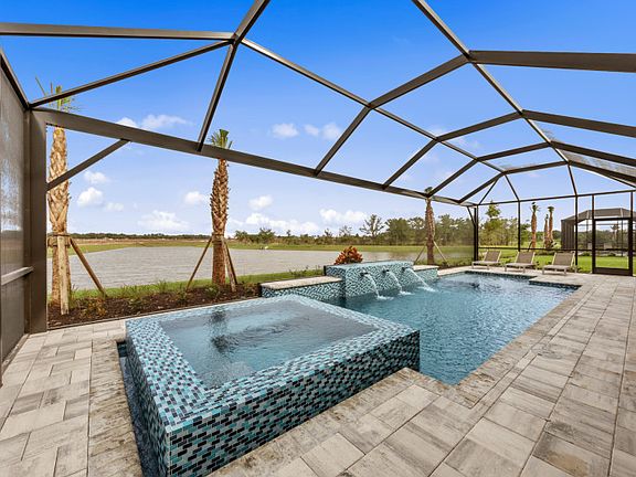 Screened-in extended lanai with custom pool and spa