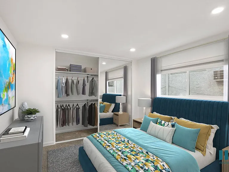 Spacious Bedroom with Vinyl Flooring and Mirrored Closet