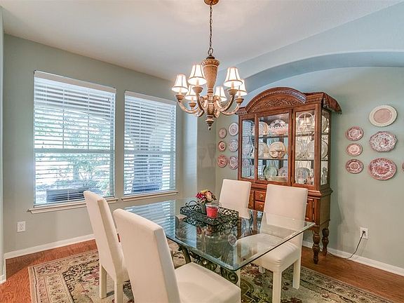 The dining room is to your left as you enter the home. It enjoys great views out towards the covered front porch.
