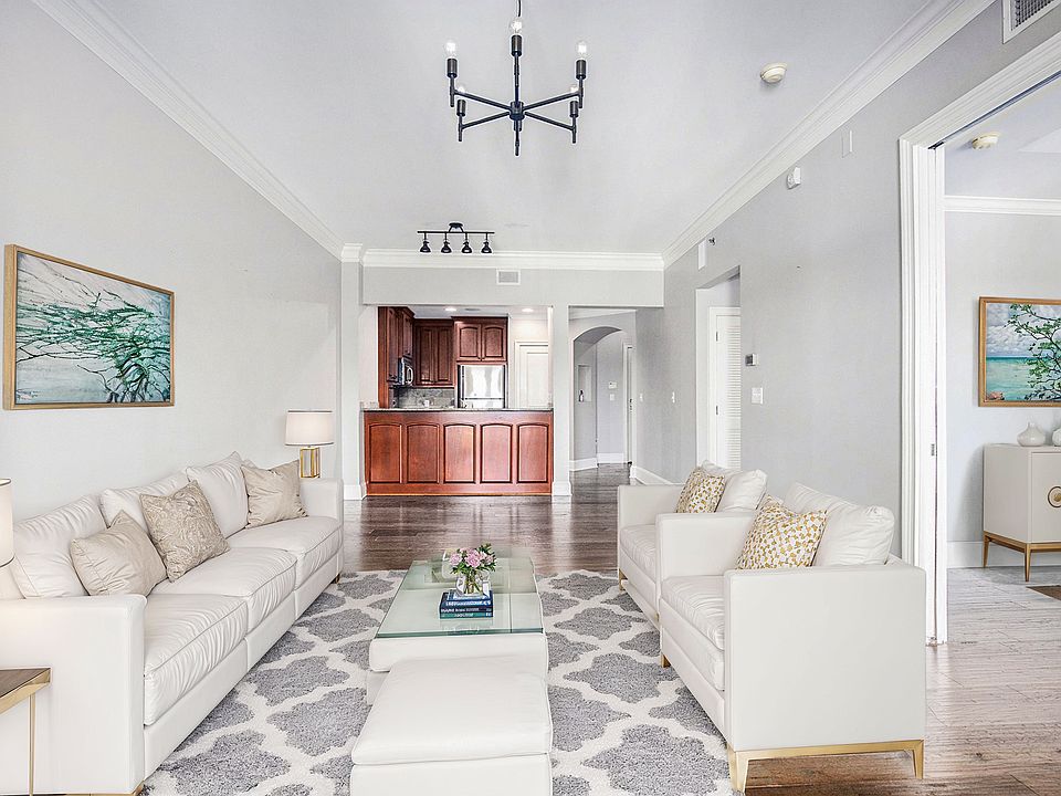 Large living/dining area - virtually staged