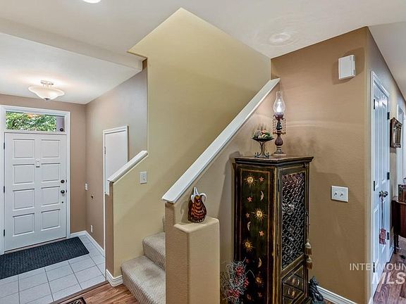 Front entry and stairs from inside, not furnished exactly as pictured.