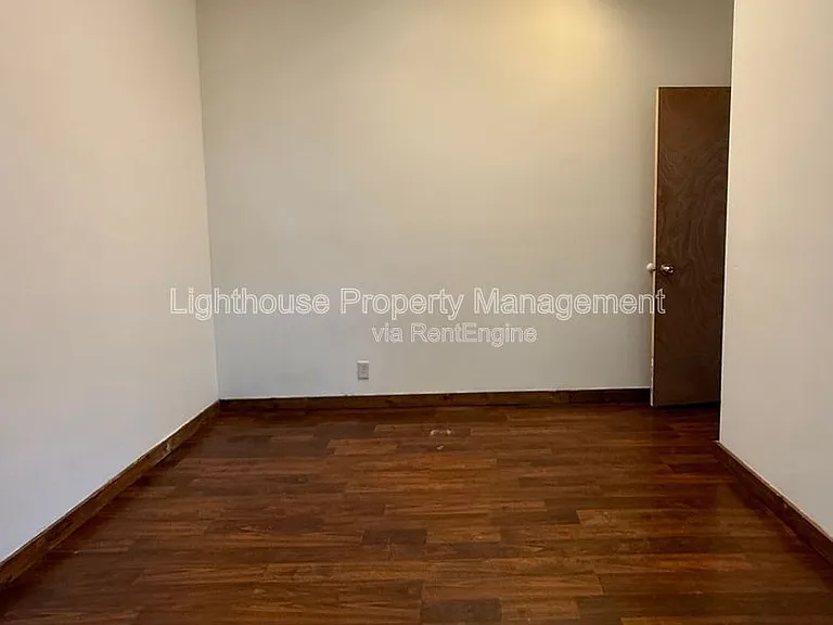 8118 Howard St — Photo 13