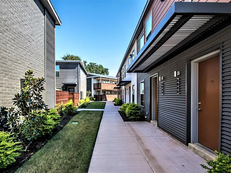 Contemporary architecture with spacious balconies and walkways.