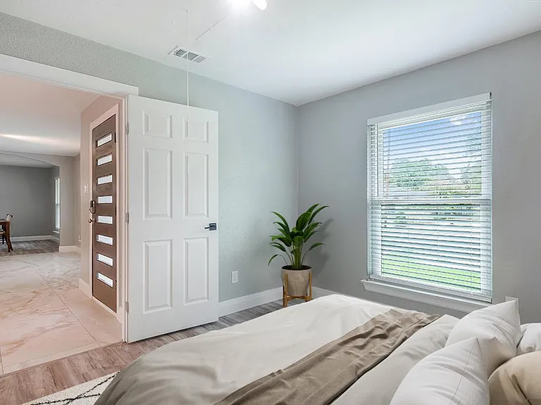 Bedroom 6. This image shows a virtually furnished space. Bedrooms come unfurnished.