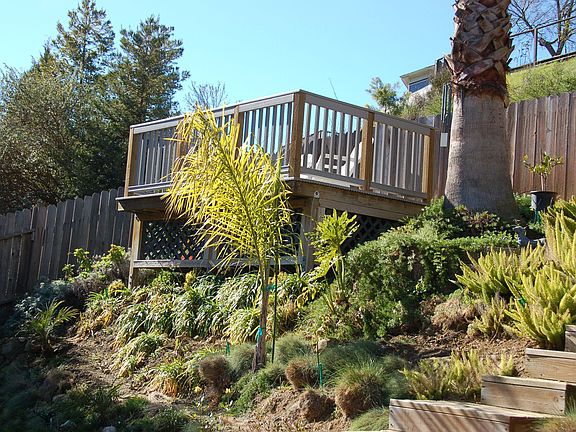 Viewing deck constructed with man-made composite decking materials.