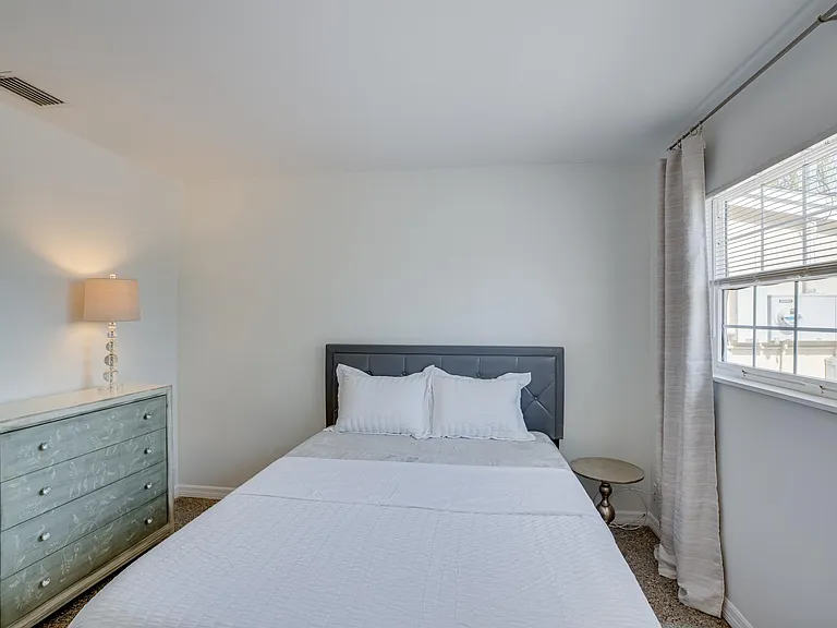 Furnished bedroom #1 with access to completely remodeled Jack & Jill bath
