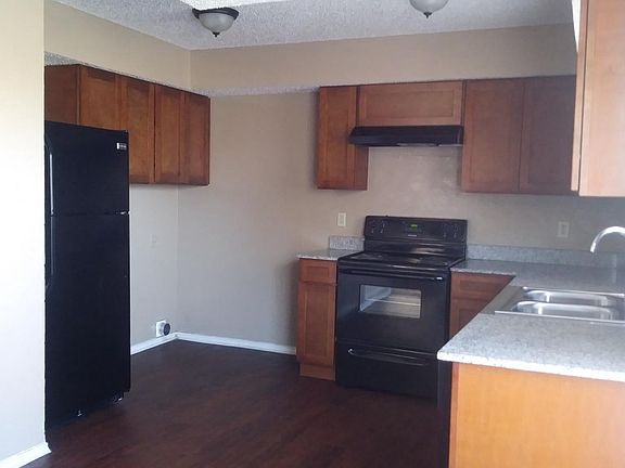 Open Kitchen with granite counters and upgraded cabinets and